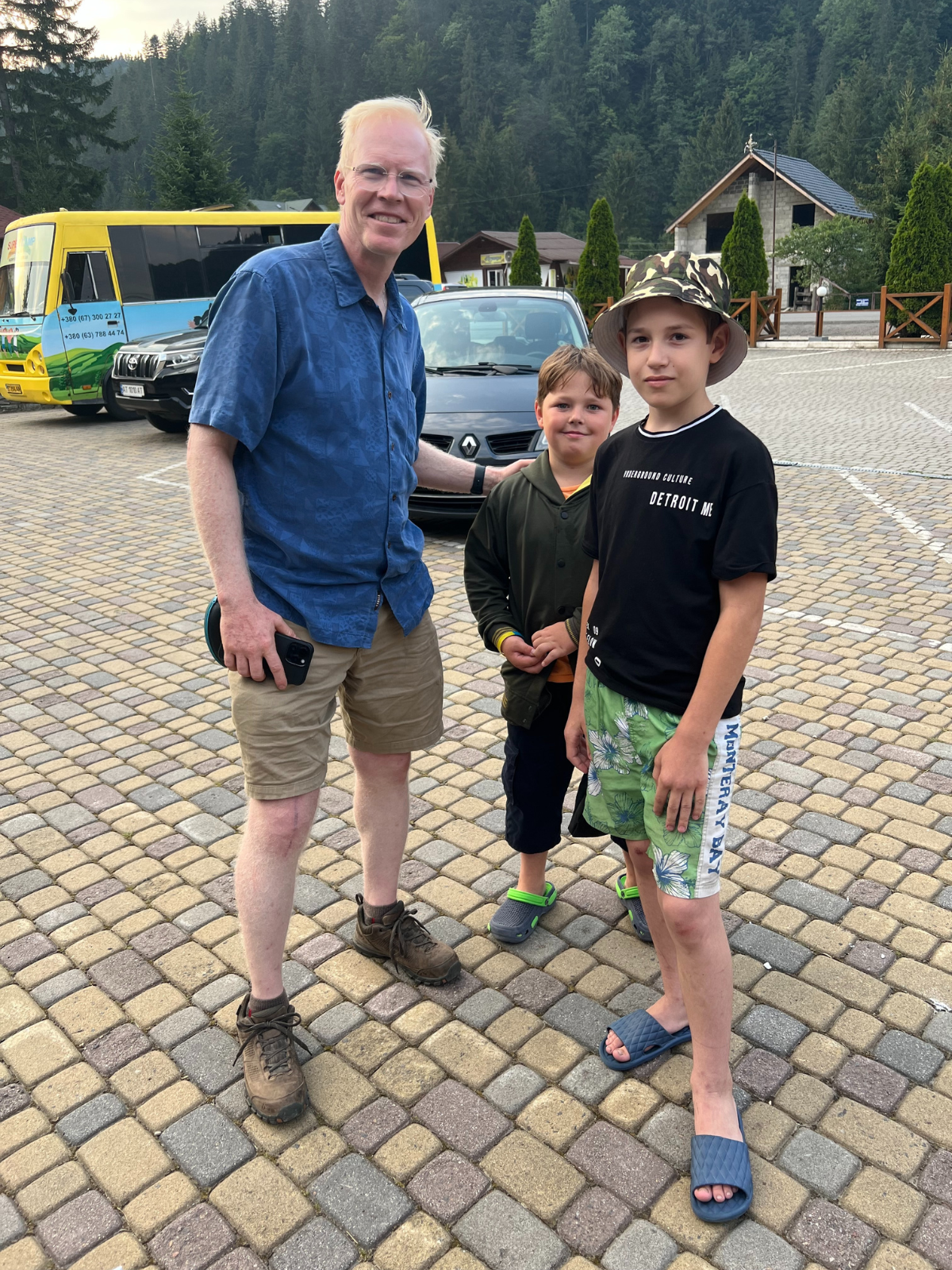 Volunteer Mike Brady with Ukrainian children on Frontier Horizon impact trip