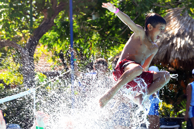 child playing in waterpark